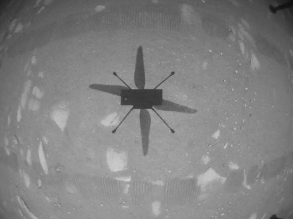 NASA's Ingenuity Mars helicopter transmits back the first image of its historic inaugural flight on Mars